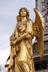 Golden statue of angel on the fountain in front of cathedral Assumption of the Virgin Mary in Zagreb, Croatia