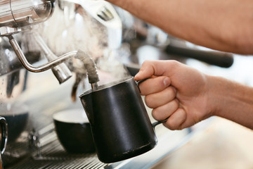 Barista Preparing Coffee On Coffee Machine