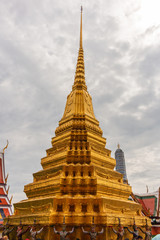 Fototapeta premium Temple of the Emerald Buddha is Wat Phra Kaew or Wat Phra Si Rattana Satsadaram. It is regarded as the most sacred Buddhist temple (wat) in Thailand.