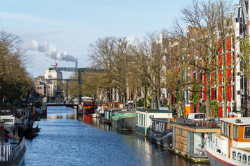 Beautiful Architecture Of Dutch Houses and Houseboats On Amsterdam Canal In Autumn