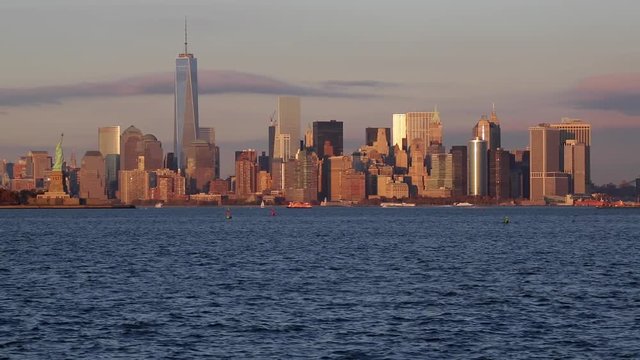 Statue of Liberty, One World Trade Center and Downtown Manhattan across the Hudson River, New York, Manhattan, United States of America