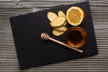 Ginger root on a gray wooden background