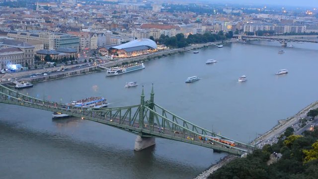 Timelapse view of ship traffic on the Danube river at Liberty bridge in central Budapest which splits the Buda and Pest parts of the city.