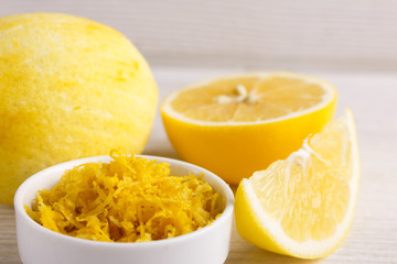 Lemon and juice on a white background