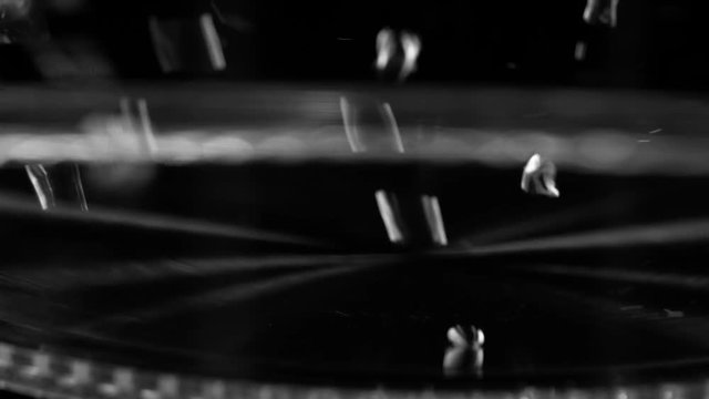 Bubbles water on a black background rise up. Close up