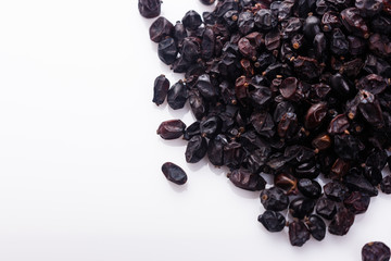 dried barberry berries on the rustic background