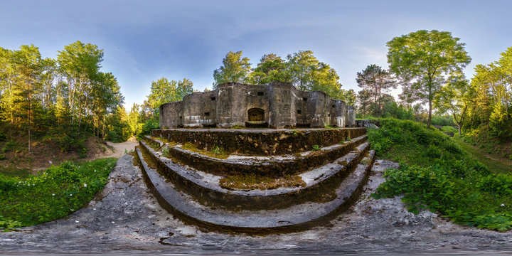 full seamless panorama 360 angle view battle position on abandoned military fortress of the First World War in forest in rays of setting sun in equirectangular spherical projection, skybox VR content