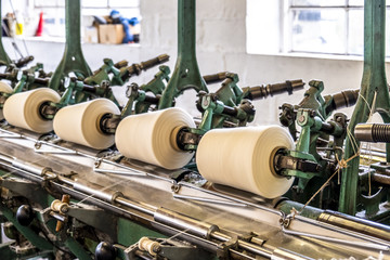 Cop winder of historic woolen mill production in Wales - United Kingdom