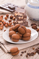 Hazelnut shortbread sandwiches filled with chocolate cream.