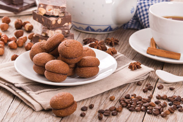 Hazelnut shortbread sandwiches filled with chocolate cream.