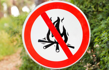 Sign or symbol no campfire, do not light a fire. No Campfires sign, in nature by sea. No open flame...