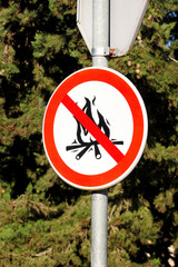 Sign or symbol no campfire, do not light a fire. No Campfires sign, in nature by sea. No open flame...
