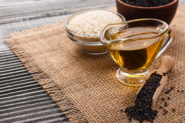 fresh sesame seeds on a rustic background