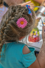 Girl who painted and has beautiful hair decorations