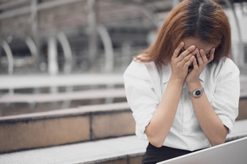 Fototapeta premium a woman in feeling exhausted and depressed from frustrated. anxiety concept.