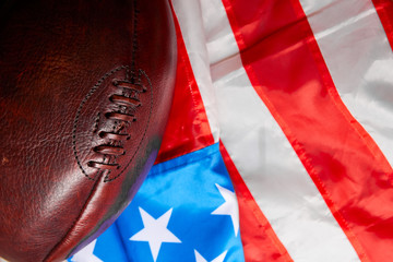 American football ball and old glory flag..