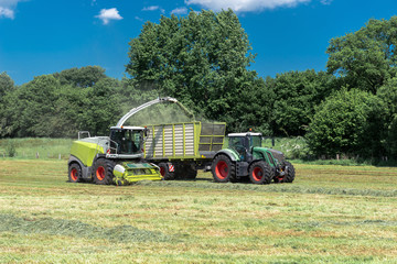 Obraz premium Farm machines at the hay harvest | 8897