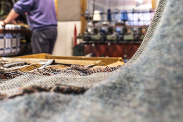 Historic woolen mill production background with Tweed