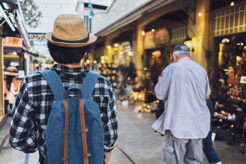 Asian man bag pack tourist in travelling at Thailand.
