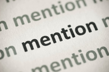 Obraz premium word mention printed on paper macro