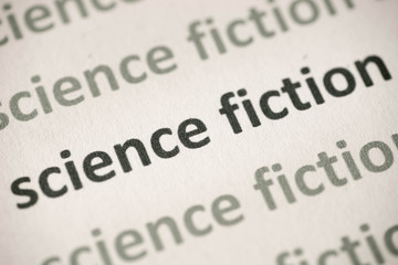 Fototapeta premium words science fiction printed on paper macro