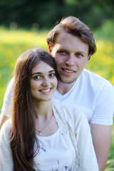 Fototapeta premium Young couple walking in the woods