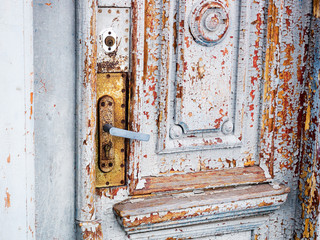 The old front door. Cracked paint. Background