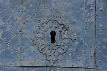 old  door lock with iron patern. Ancient temple with decorations