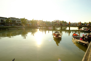 Hoai river in ancient Hoian town , Vietnam. Hoian is recognized as a World Heritage Site by UNESCO.