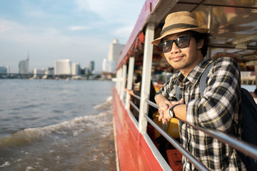 Fototapeta premium Asian man bag pack tourist in travelling at Thailand.