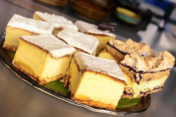 pieces of cheesecake on the ceramic plate