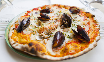 pizza with seafood shells and shrimp