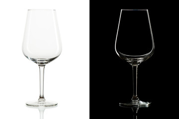 Empty tall wine glasses on black and  white background, isolated