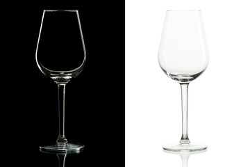 Empty tall wine glasses on black and  white background, isolated