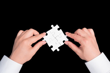 two hand holding connecting piece jigsaw puzzle, Business connection, success and strategy concept.
