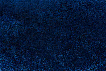 Glossy deep blue leather texture background of small grain