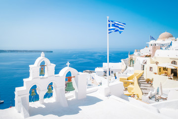 village of Oia Santorini Greece on a bright summer day - obrazy, fototapety, plakaty