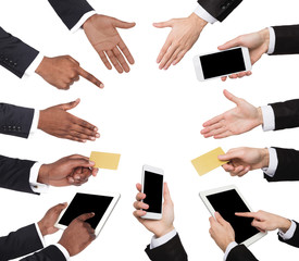 White and black male hands holding items and showing symbols.