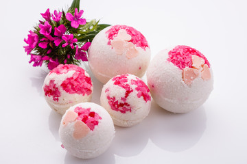 bath bombs on a white acrylic background