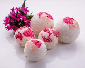 bath bombs on a white acrylic background
