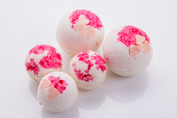 bath bombs on a white acrylic background