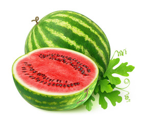 Isolated cut watermelon. One and half watermelon fruit with leaves isolated on white background