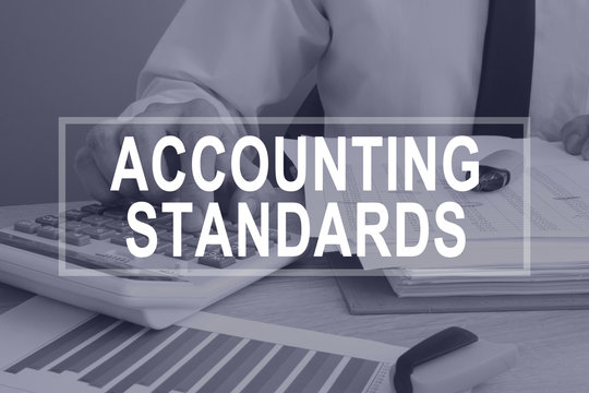 Accounting Standards Concept. Man Working With Report.