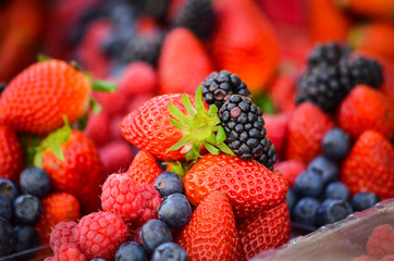 fresh fruits close up view - strawberry, blueberry, red berry, raspberry, blackberry