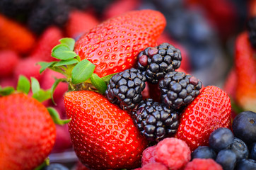 fresh fruits close up view - strawberry, blueberry, red berry, raspberry, blackberry