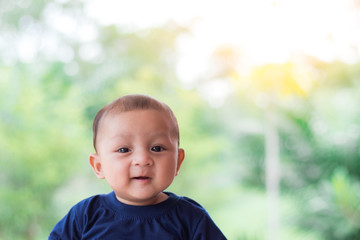 infant smiling , cute asian baby