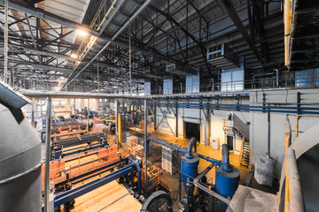 Fototapeta premium Fiberglass production industry equipment at manufacture background