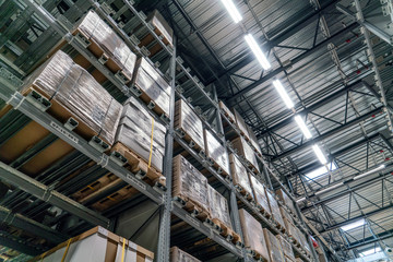 Industrial warehouses and shelves with boxes