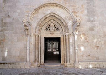 Fototapeta na wymiar Portal of the St Mark s Cathedral in the historic city Korcula at the island Korcula in Croatia