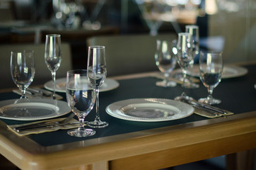Empty glasses in restaurant, table setting